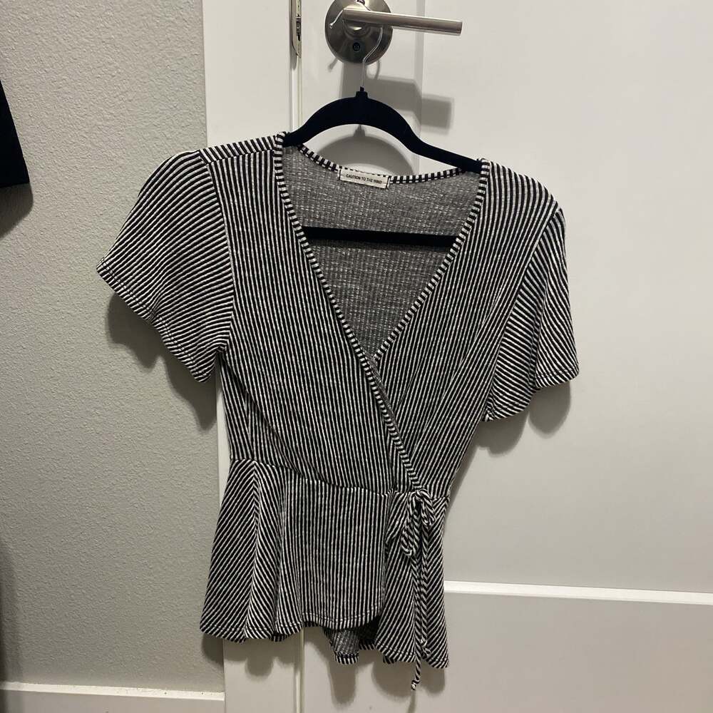 Caution To The Wind Black White Striped Faux Wrap Peplum Top